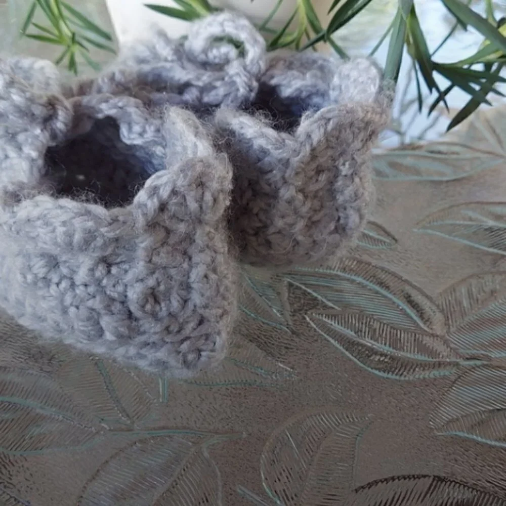 Handmade baby booties.
